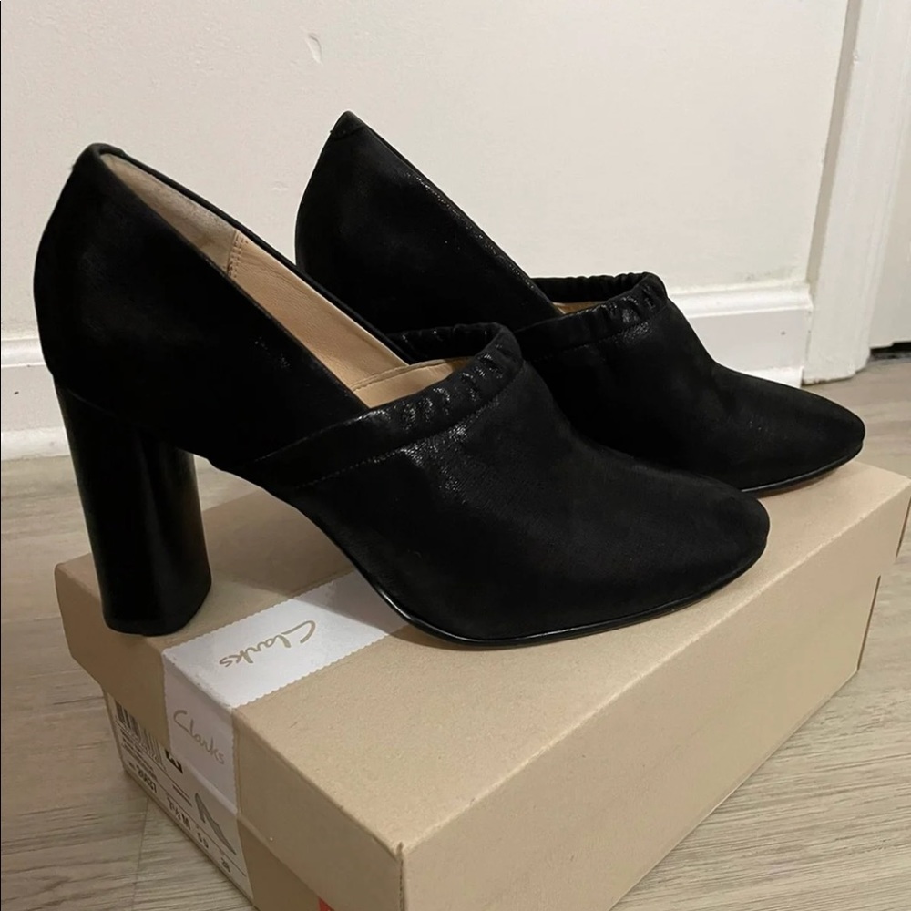 Clarks metallic Grace Bay black booties. 3 1/4” heel. Almost like new.
